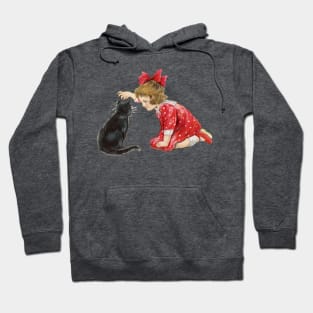 Little girl playing with black cat at Christmas Hoodie